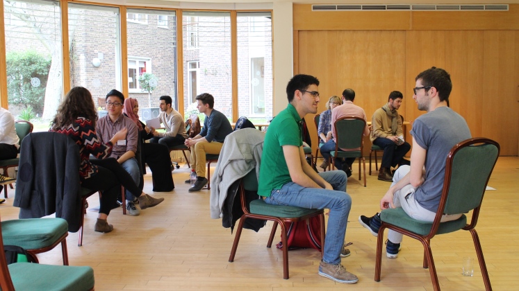 Group on the Faith and Leadership residential in dialogue in mixed faith pairs.