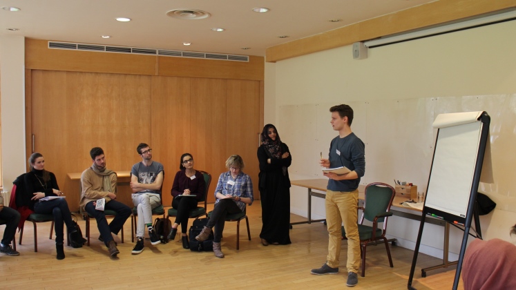 Male student giving a presentation to the whole group during the Faith and Leadership residential.