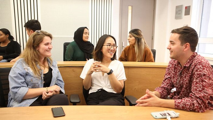 Students chatting in SAL